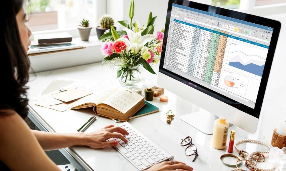 woman working as data analyst on a laptop