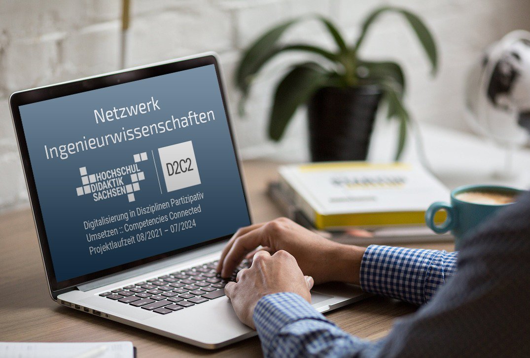 Aufgeklappter Laptop mit der Aufschrift "Netzwerk Ingenieurwissenschaften auf dem Bildschirm"